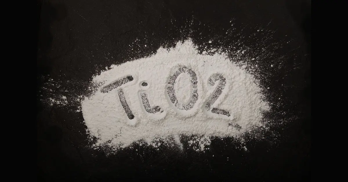 Titanium Dioxide Powder Titanium dioxide powder scattered on black surface